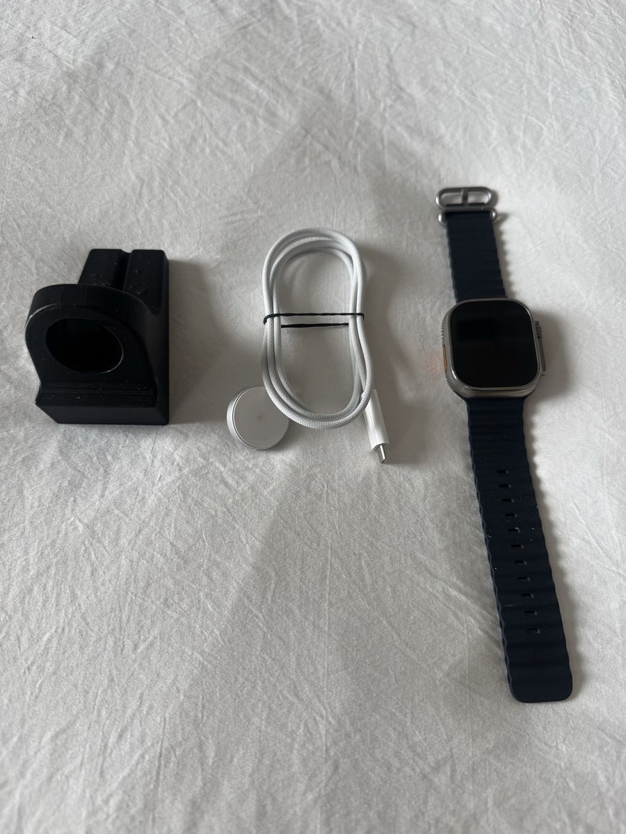 Apple Watch Ultra with Ocean Band, Charging Cable, and Stand