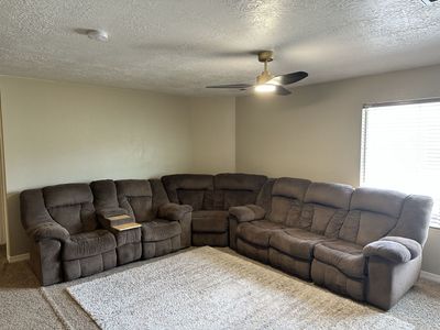 Large Brown Microfiber Reclining Sectional Sofa with Storage Console - Minor Wear