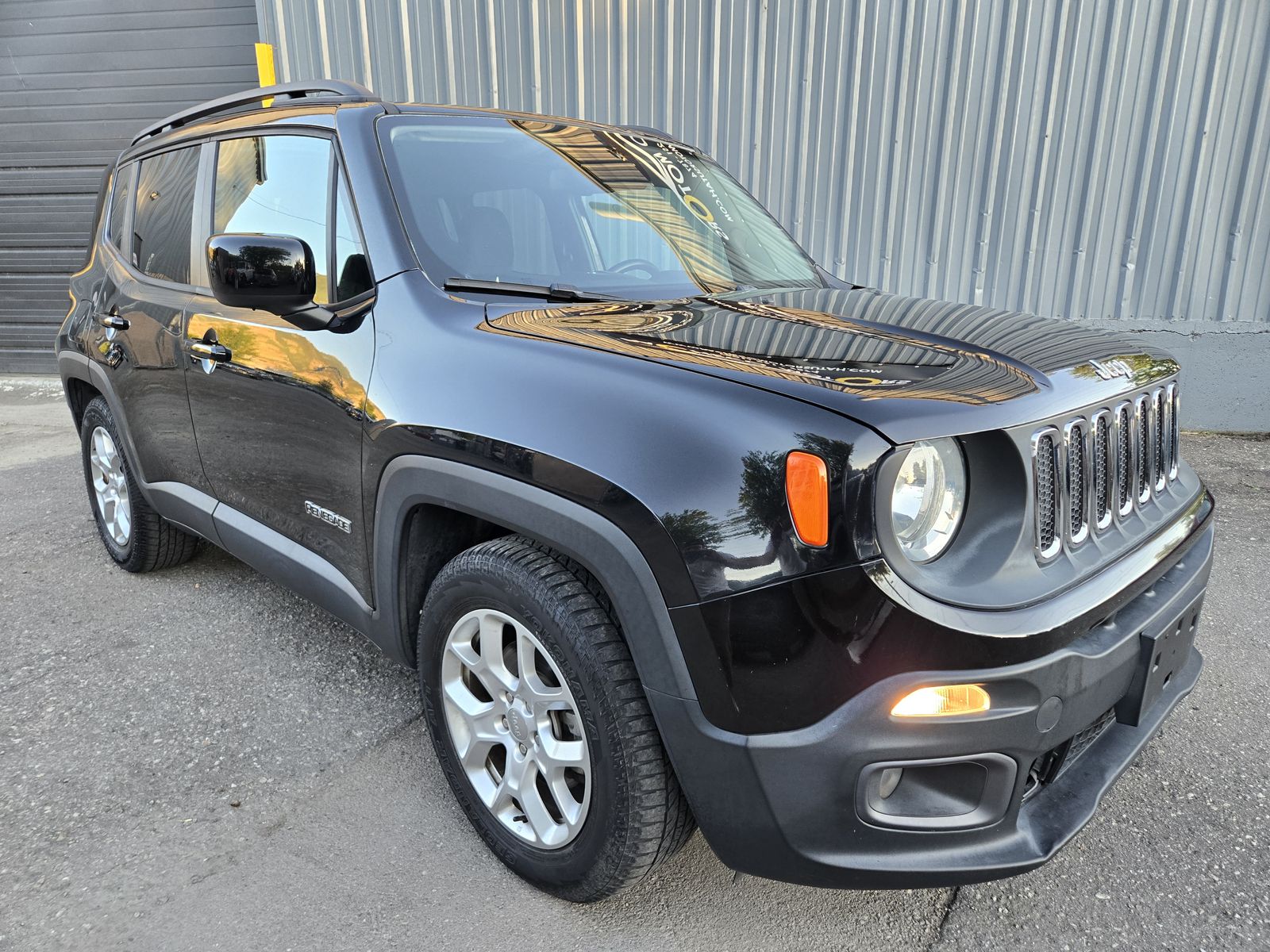 2016 Jeep Renegade Latitude — rebuilt & branded title, 18% below market