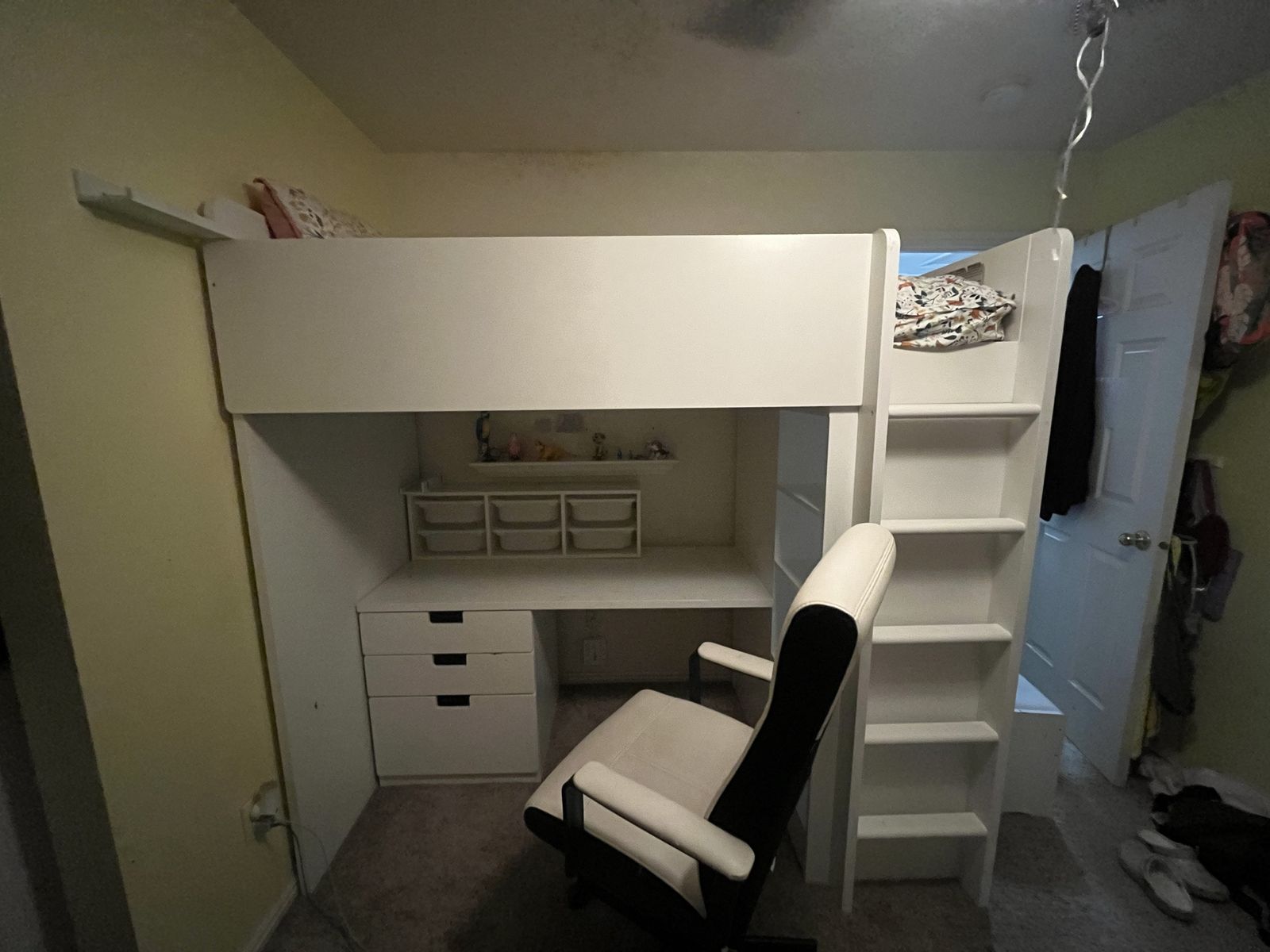 Twin loft bed from IKEA with drawers, desk, closet, and shelves mattress included and desk chair and if you want the sheets  