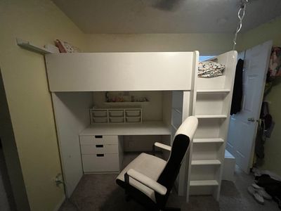 Twin loft bed from IKEA with drawers, desk, closet, and shelves mattress included and desk chair and if you want the sheets