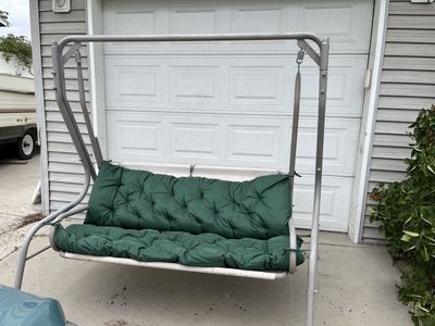 Porch swing with legs