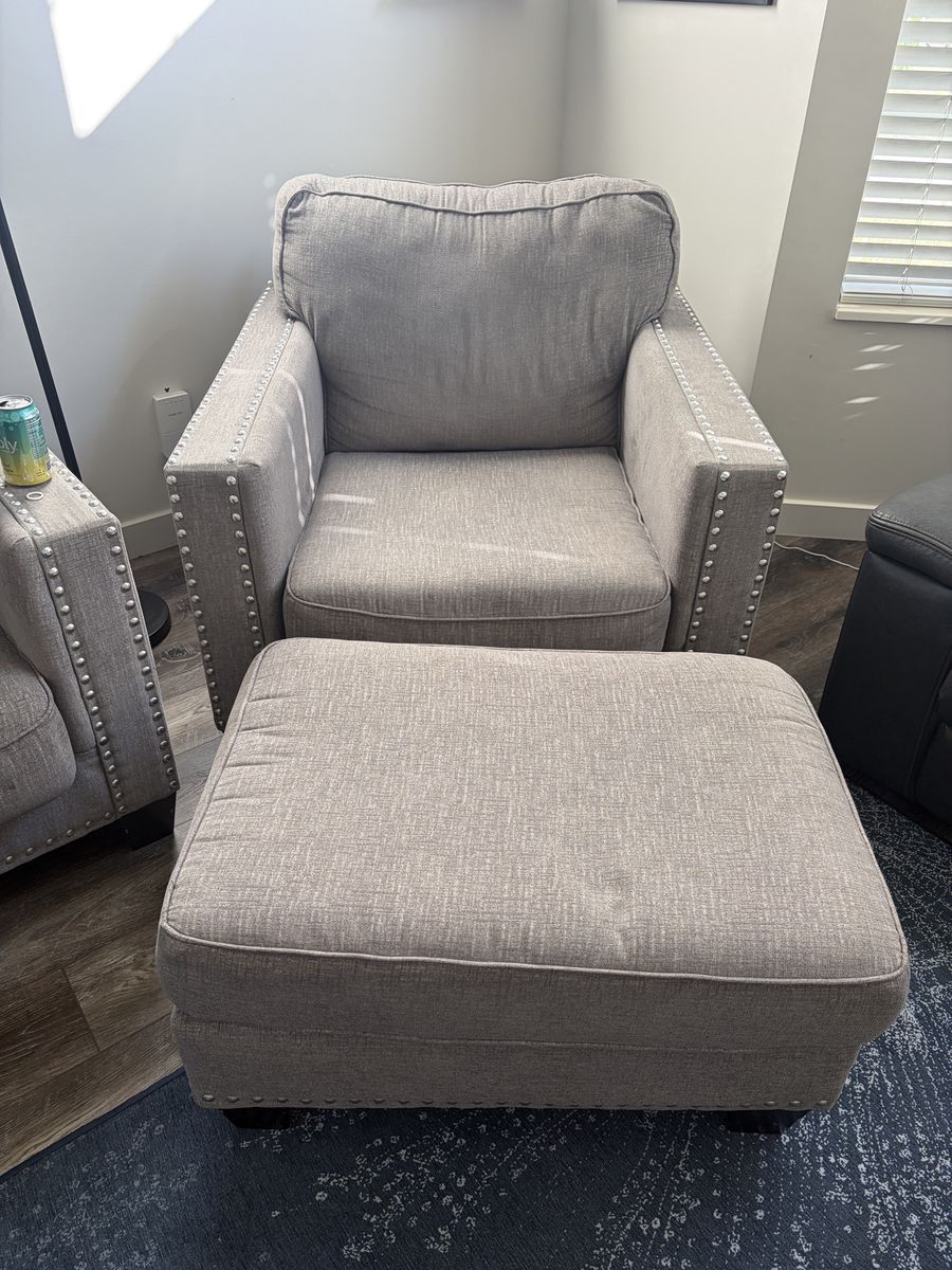 Gray Fabric Armchair with Matching Ottoman and Nailhead Trim