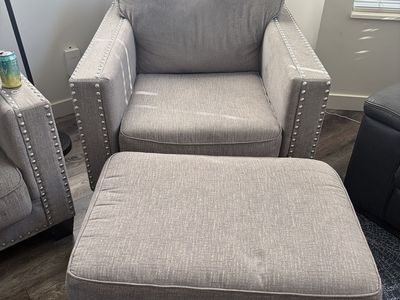 Gray Fabric Armchair with Matching Ottoman and Nailhead Trim