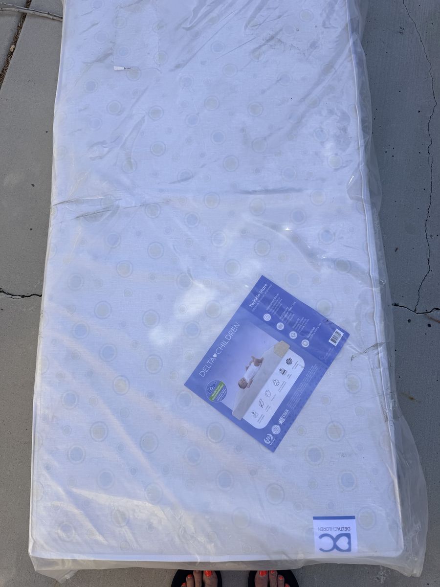 Delta Children Twinkle Stars Infant & Toddler Mattress - Waterproof, Dual Sided