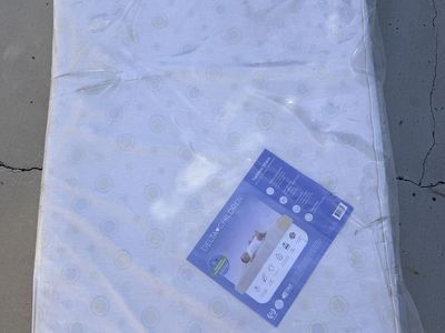 Delta Children Twinkle Stars Infant & Toddler Mattress - Waterproof, Dual Sided