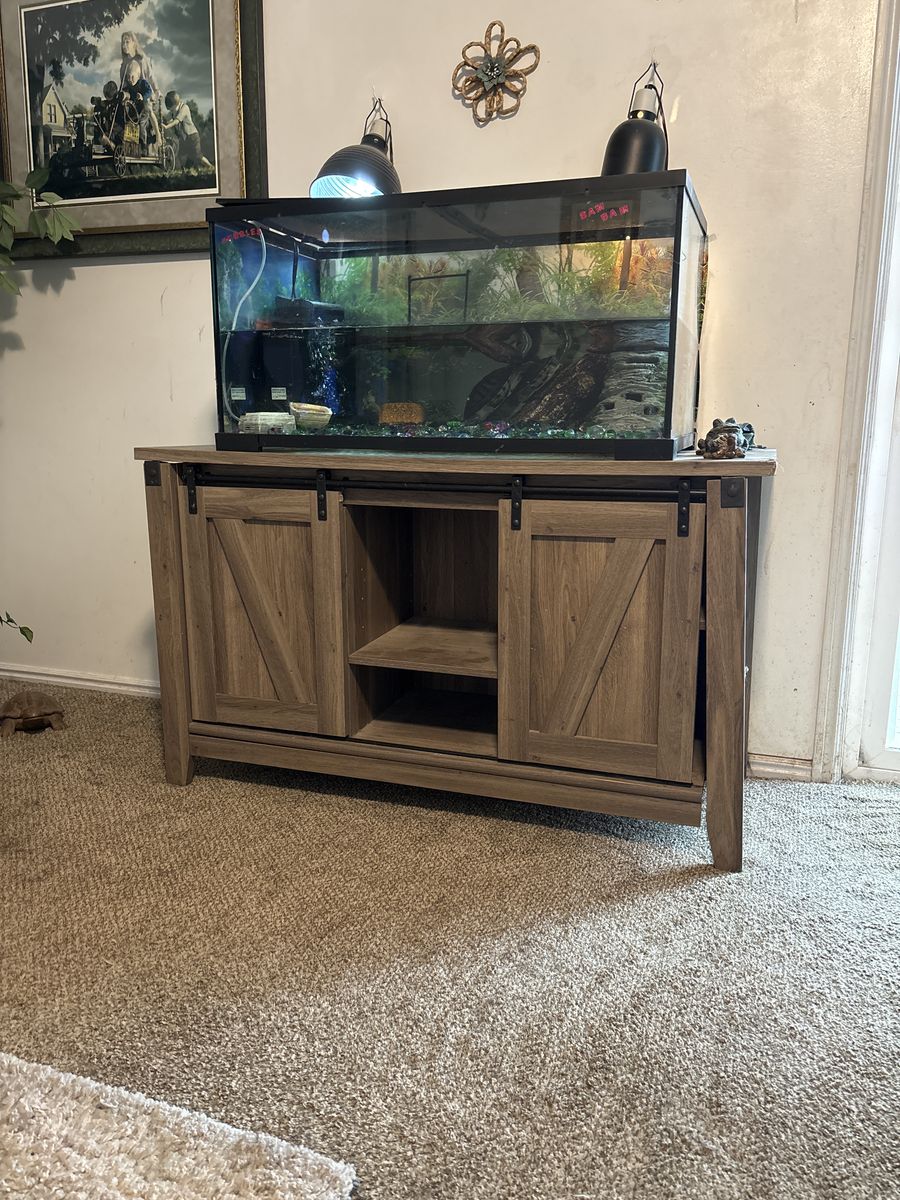 Free turtles 55 gallon tank and stand