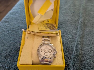 Invicta Professional Speedway 200 M Japanese movement, extra links, paperwork, box with Brand new battery in it.