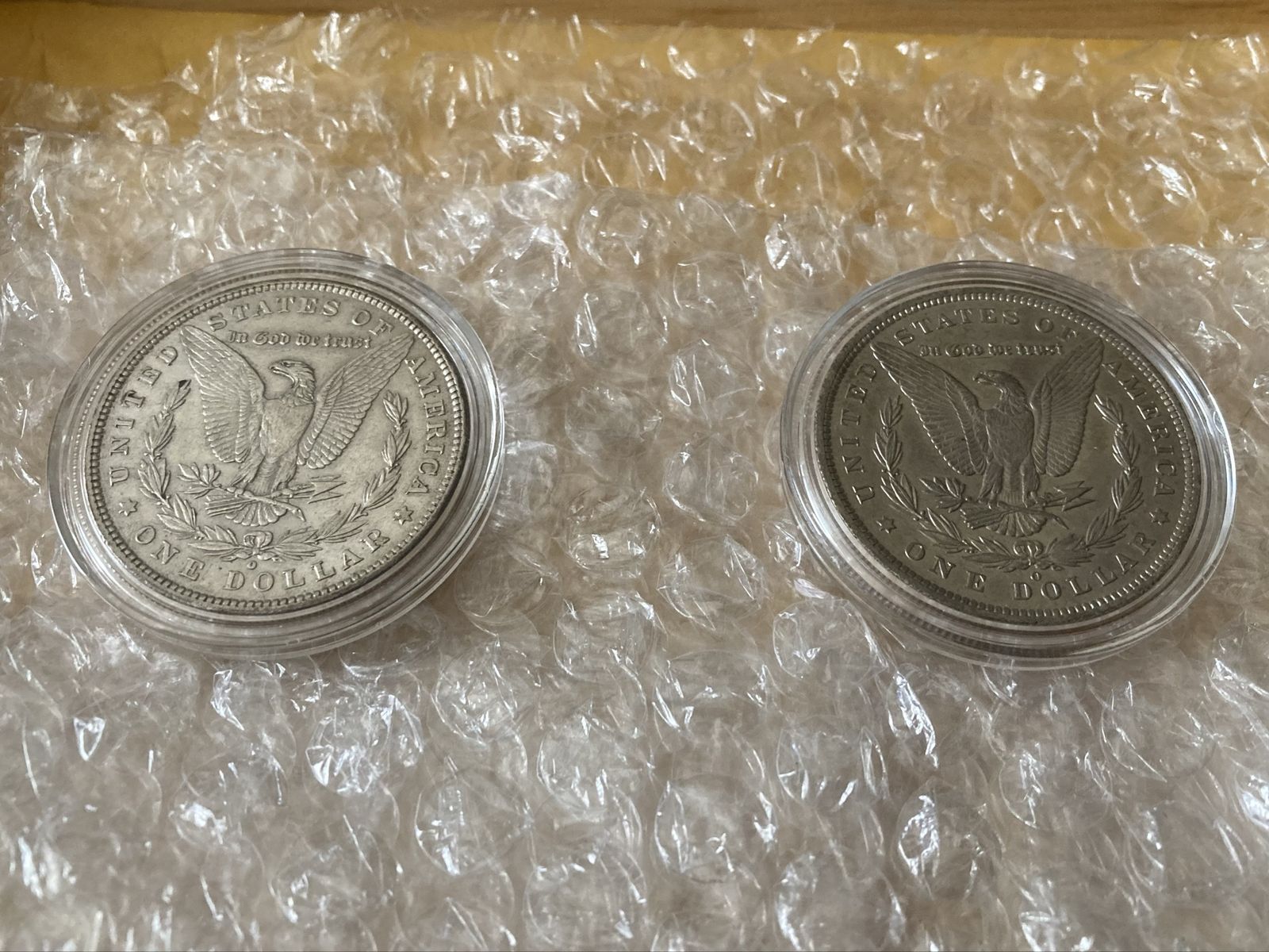 1880 o and 1885 o Morgan Silver Dollars