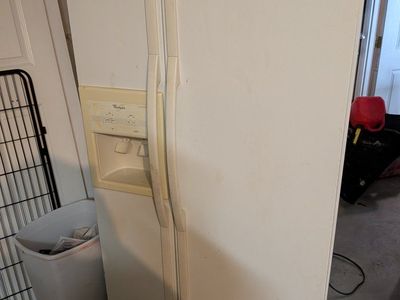 whirlpool fridge and freezer with ice dispenser