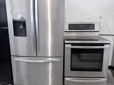 Whirlpool Fridge And LG Stove Glass Top