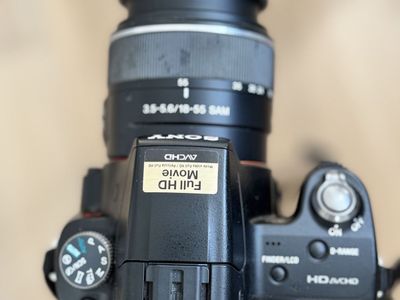 Sony Alpha SLT-A33 Digital SLR Camera w/ 18-55mm & 70-300mm Lenses, Full HD Movie w/ tripod, camera bag& extra battery & charge