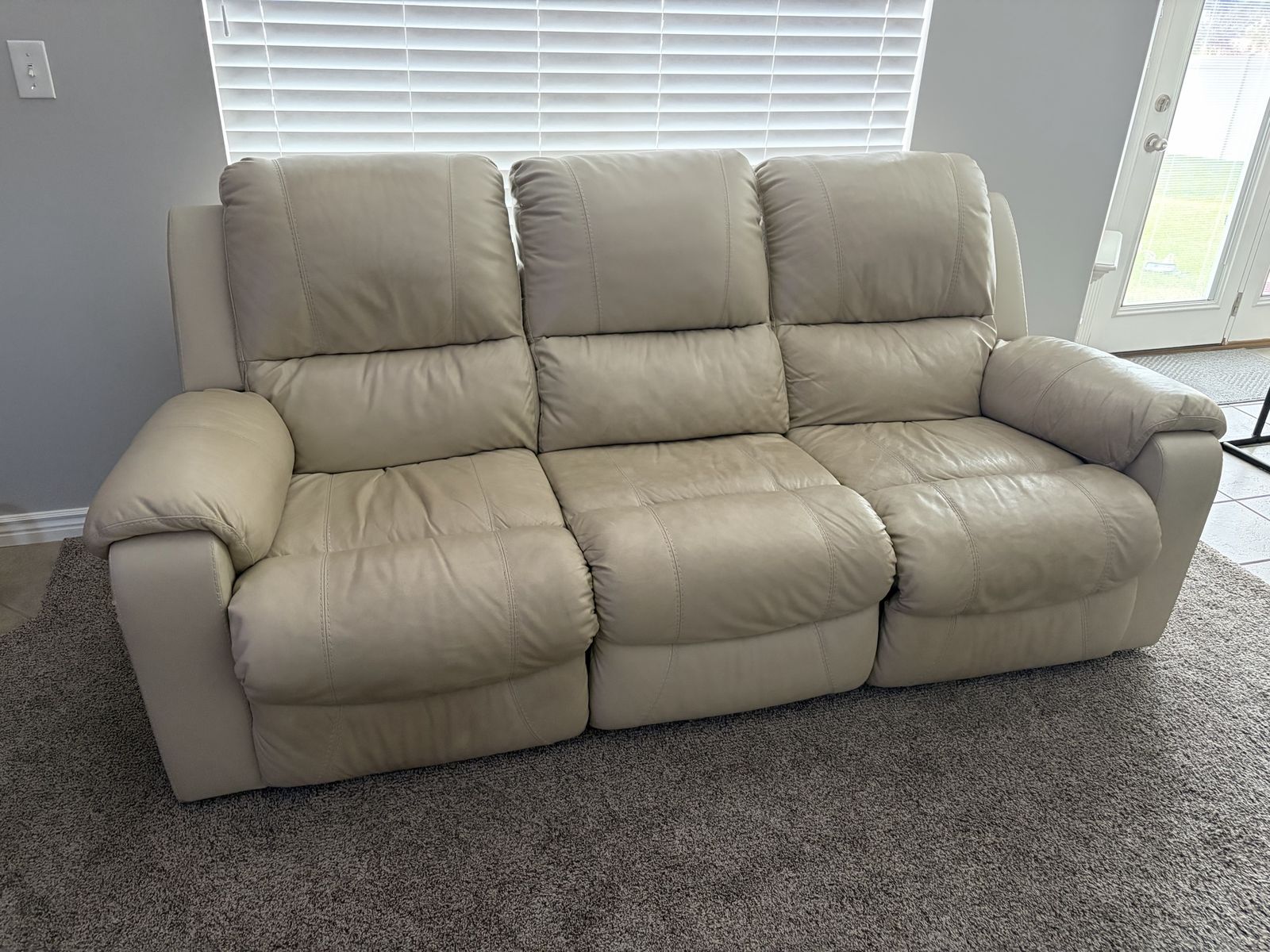 2 Ashley Leather Manual Reclining Sofas