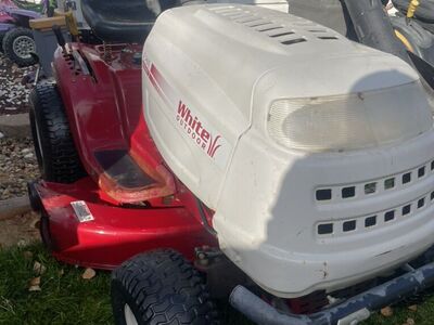 White Horse Riding Lawnmower