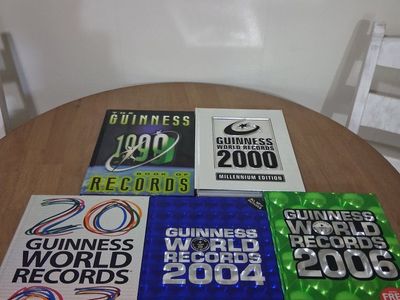 Guinness World Records Book Lot: 1999, 2000, 2003, 2004, 2006 Edition Set
sold as set