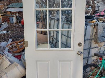 White Wood Frame Door with 9-Pane Glass Insert - Standard Size Entry Door 36" used