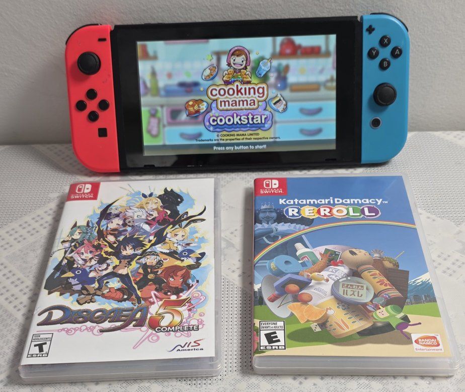Nintendo Switch System and 3 games+cover.
