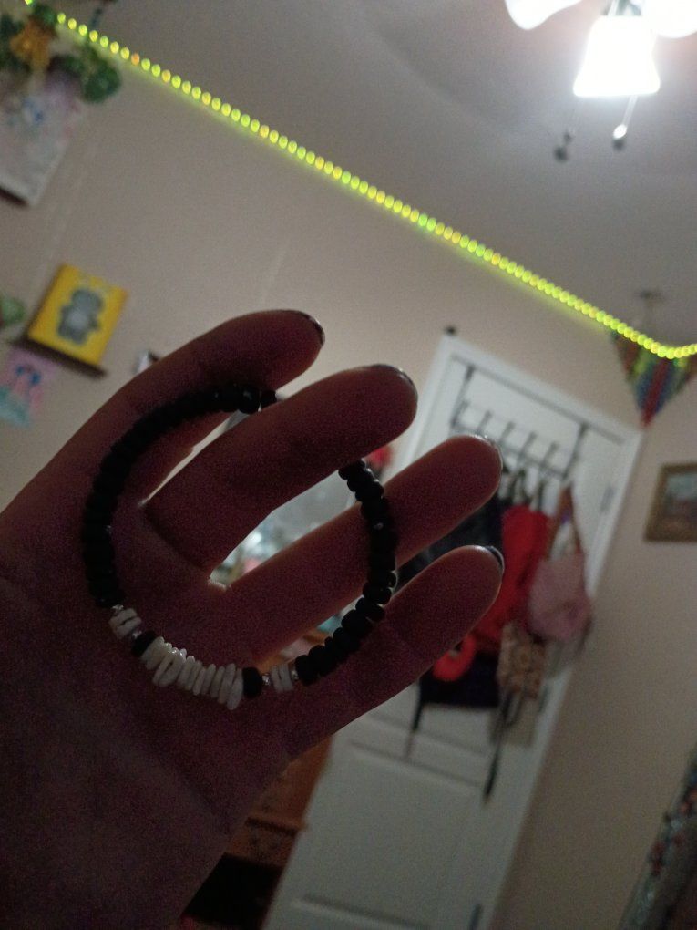 Handmade Black and White Beaded Bracelet with Shell Accents