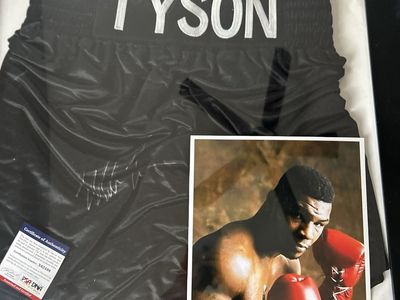 Mike Tyson singed boxing shorts and DNA cert