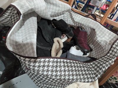 an entire bag of size 8 fancy shoes you name it. the kind it's in here