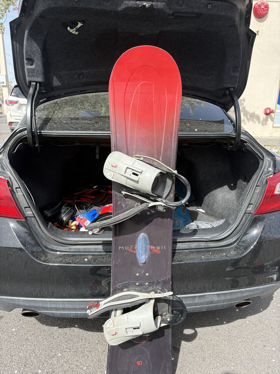 Snowboard With Burton Bindings