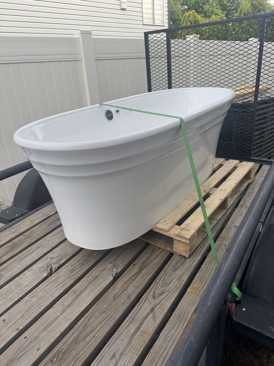 Make me an offer. I have this Victoria+Albert® Warndon 67 x 31-1/2 in. Freestanding Bathtub Center Drain in Quarrycast™ White.
