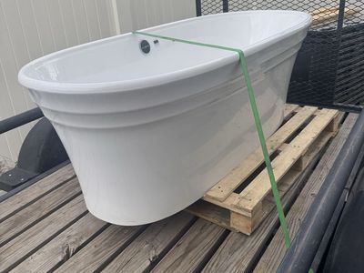 Make me an offer. I have this Victoria+Albert® Warndon 67 x 31-1/2 in. Freestanding Bathtub Center Drain in Quarrycast™ White.