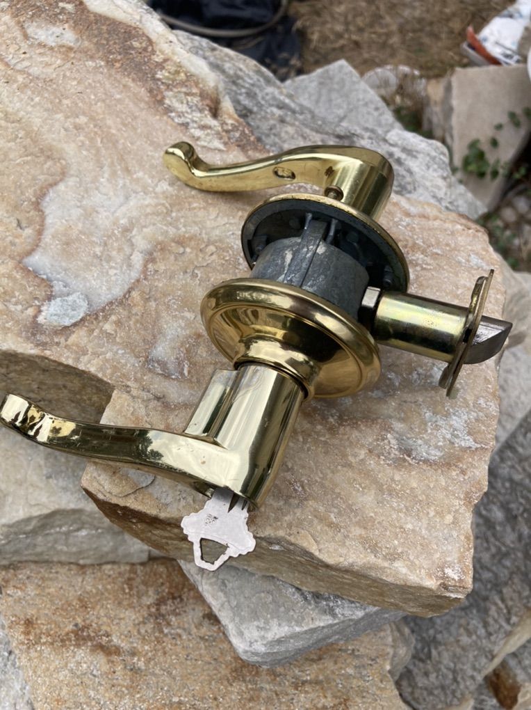 Schlage Exterior Lever Lock set. Brass Finish