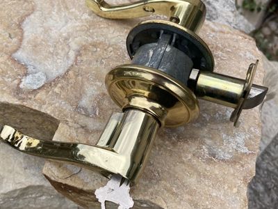 Schlage Exterior Lever Lock set. Brass Finish