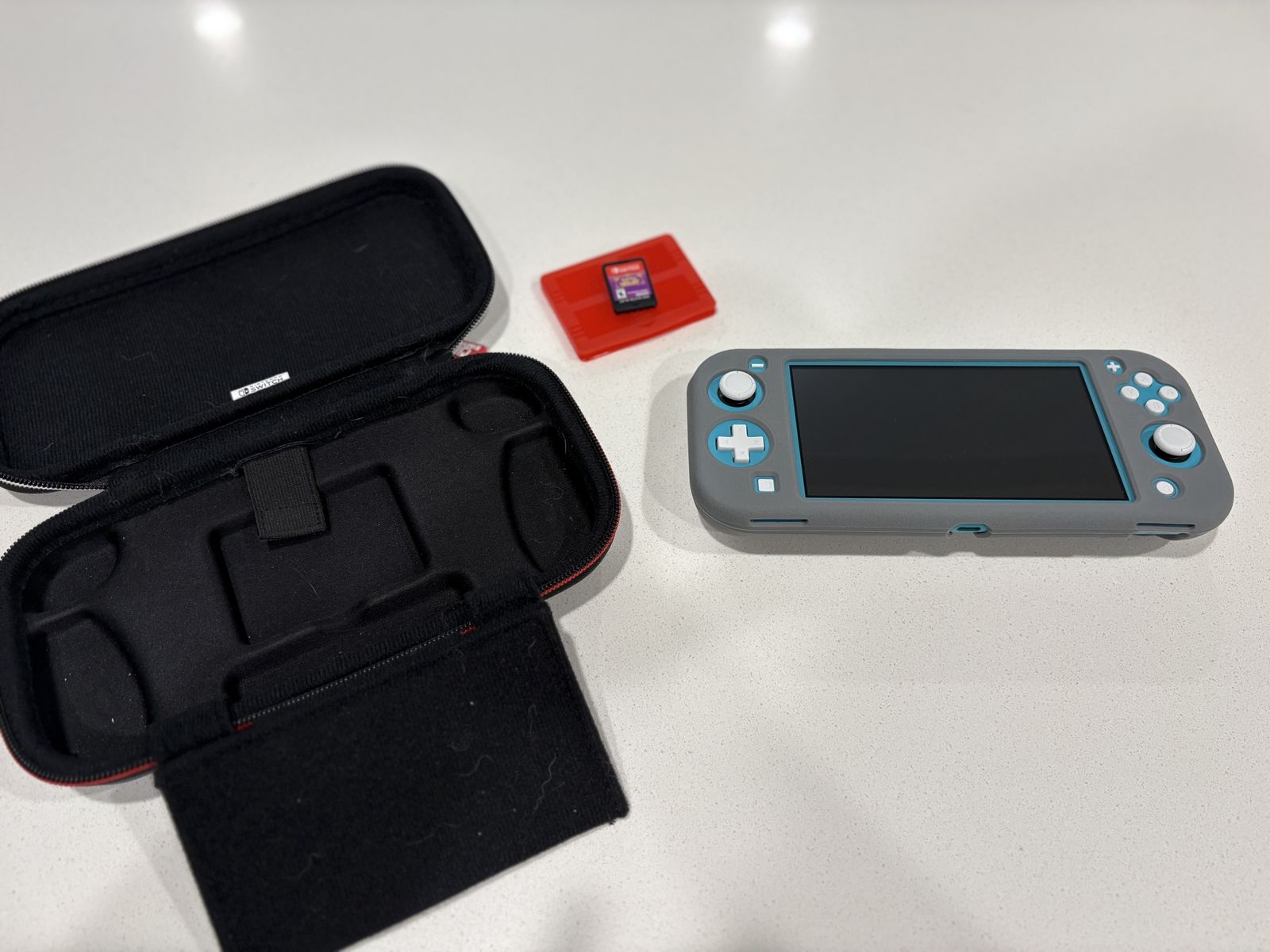 Nintendo Switch Lite + Pokémon Violet, Case and Charger!