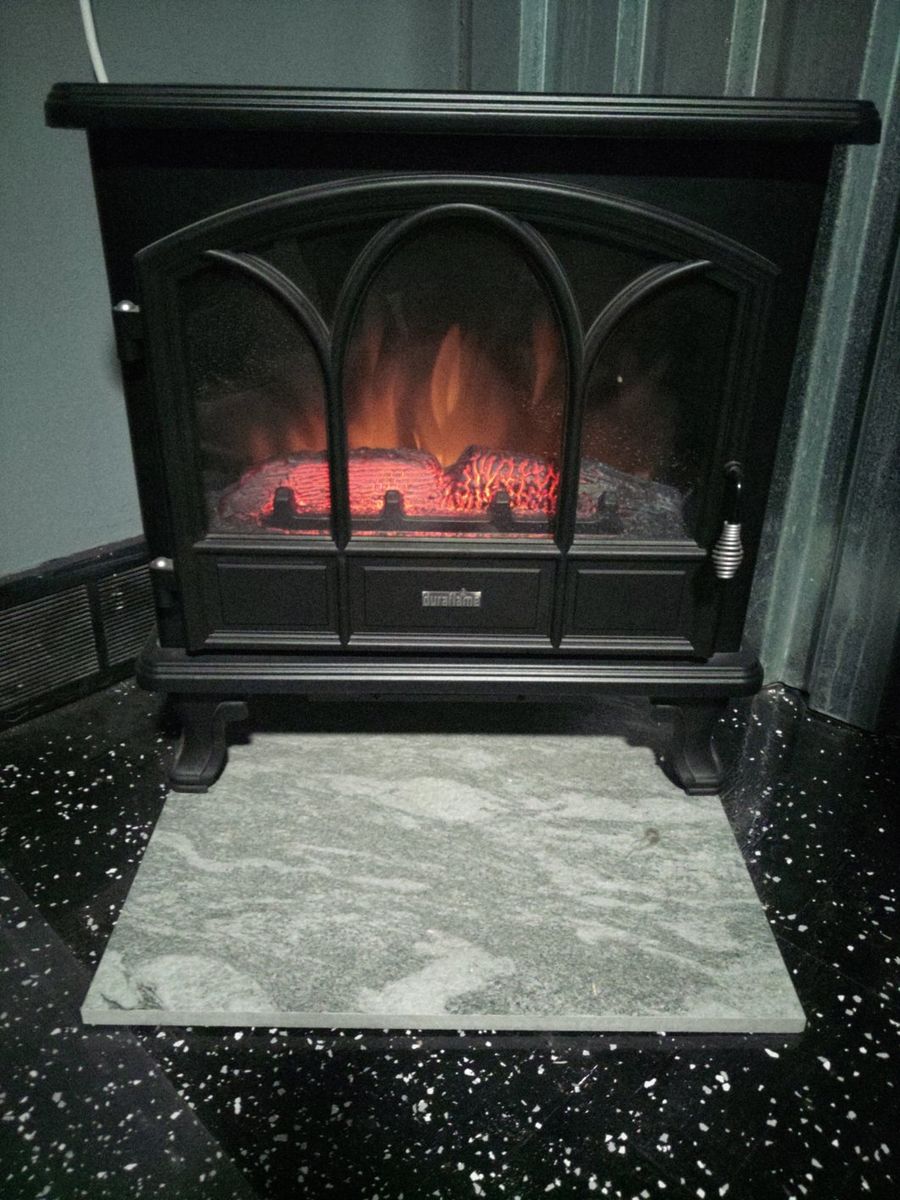 Duraflame Fireplace Heater 27x24x22 cones with remote and stone underneath