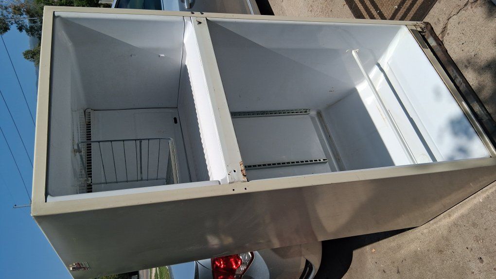 Bountiful on curb.\nScrap or still runs fridge