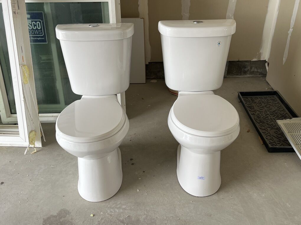2 NEARLY NEW Glacier Bay Toilets