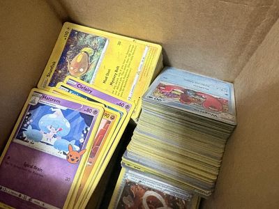 A bunch of regular pokemon cards