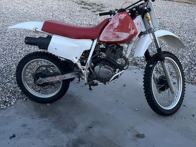 1990 xr 200, 1997 arctic cat 454, and 2003 400