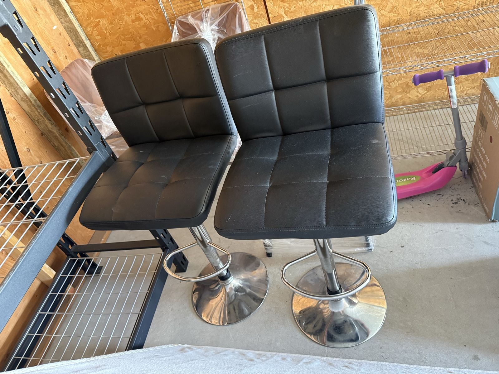 Pair of Black Tufted Adjustable Swivel Bar Stools, Faux Leather, Chrome Base