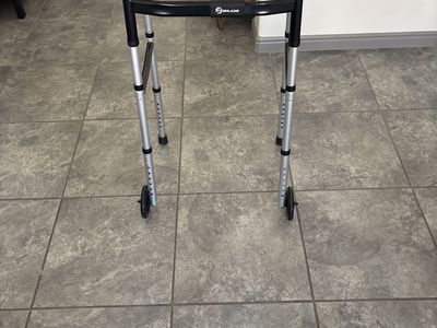 WHLICKS FOLDING WALKER