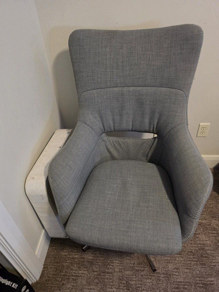 Gray Upholstered Swivel Chair