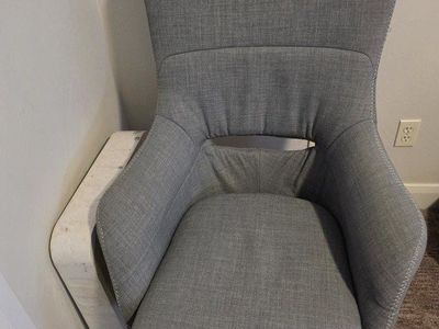 Gray Upholstered Swivel Chair