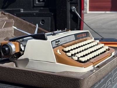Vintage manual typewriter. Mid Century Modern styling SCM Smith Corona Classic 12 model MCM