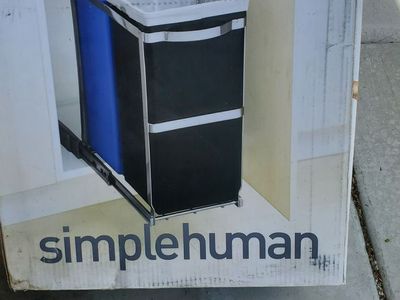 Under cabinet pull-out trash and recycling bins