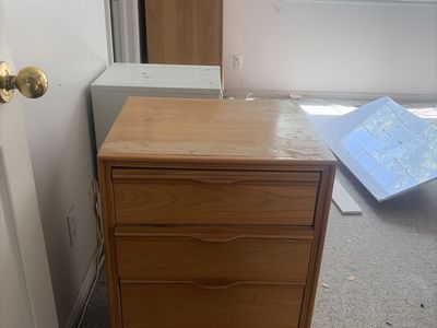 Wooden 4-Drawer Dresser - Light Wood Finish, Good Condition