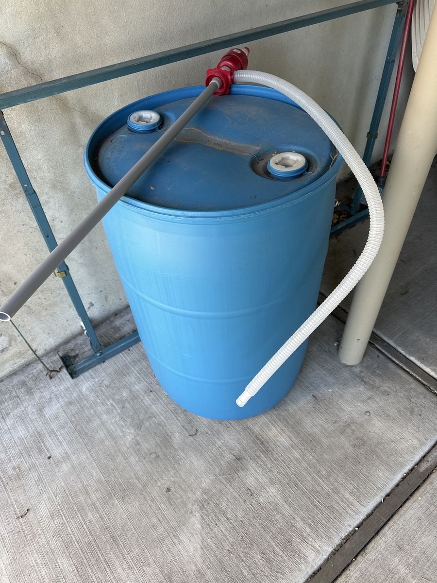 55 gallon Water storage barrel with water pump