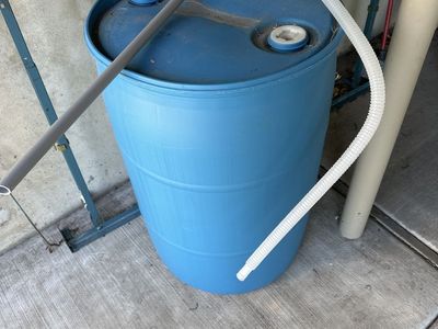 55 gallon Water storage barrel with water pump