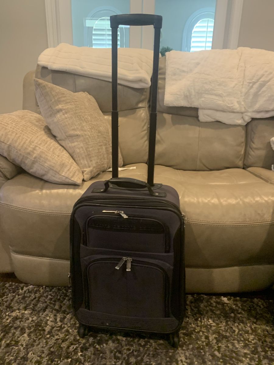 Claiborne Luggage 20” carry on 360 degree wheels