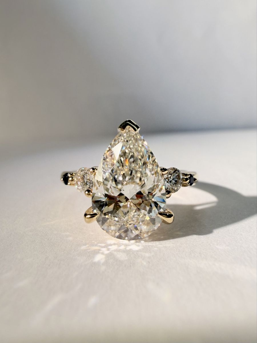 Pear Cut Lab Grown Diamond with blue sapphire Ring