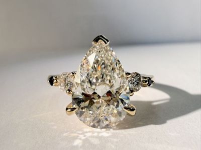Pear Cut Lab Grown Diamond with blue sapphire Ring