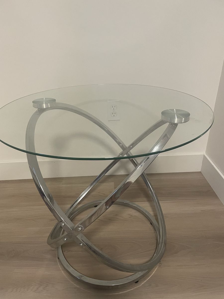 Two glass end tables