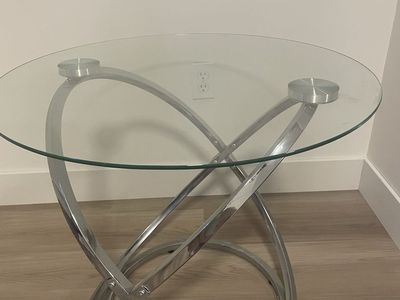 Two glass end tables