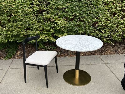 Round Marble Top Cafe Table with Brass Base and Black Accent Chair